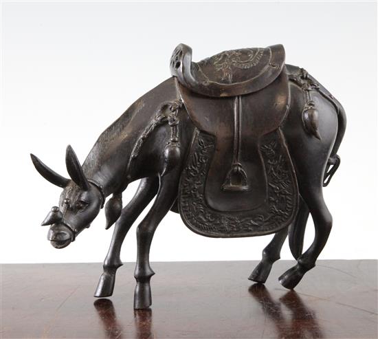 A Chinese bronze censer in the form of a mule, 18th / 19th century, 21cm